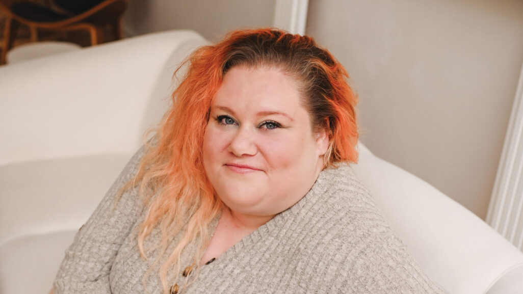 Close up photo of a woman therapist offering mental health therapy services online